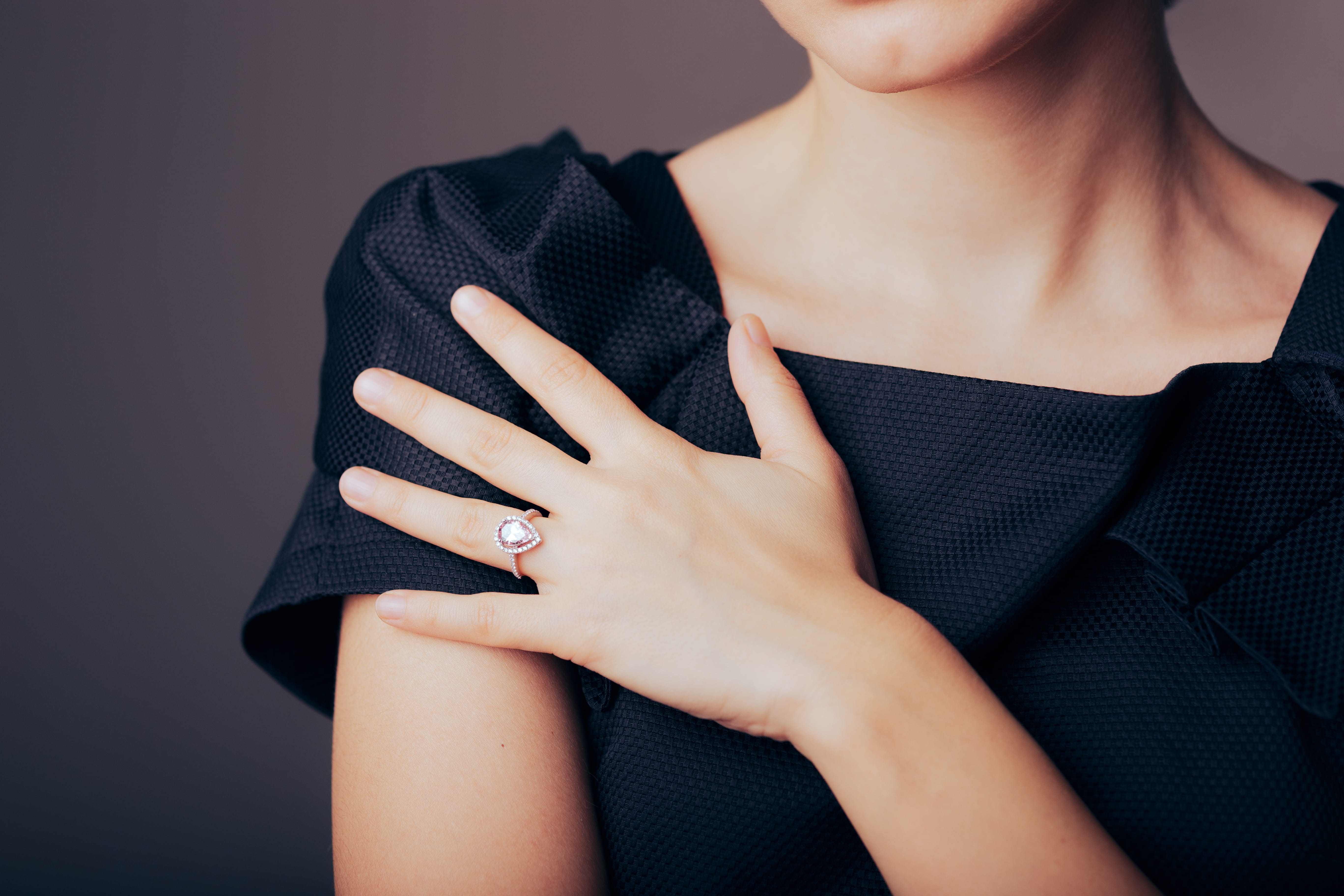 woman with pear shape ring